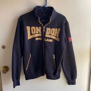 Women’s “London” zip sweatshirt.